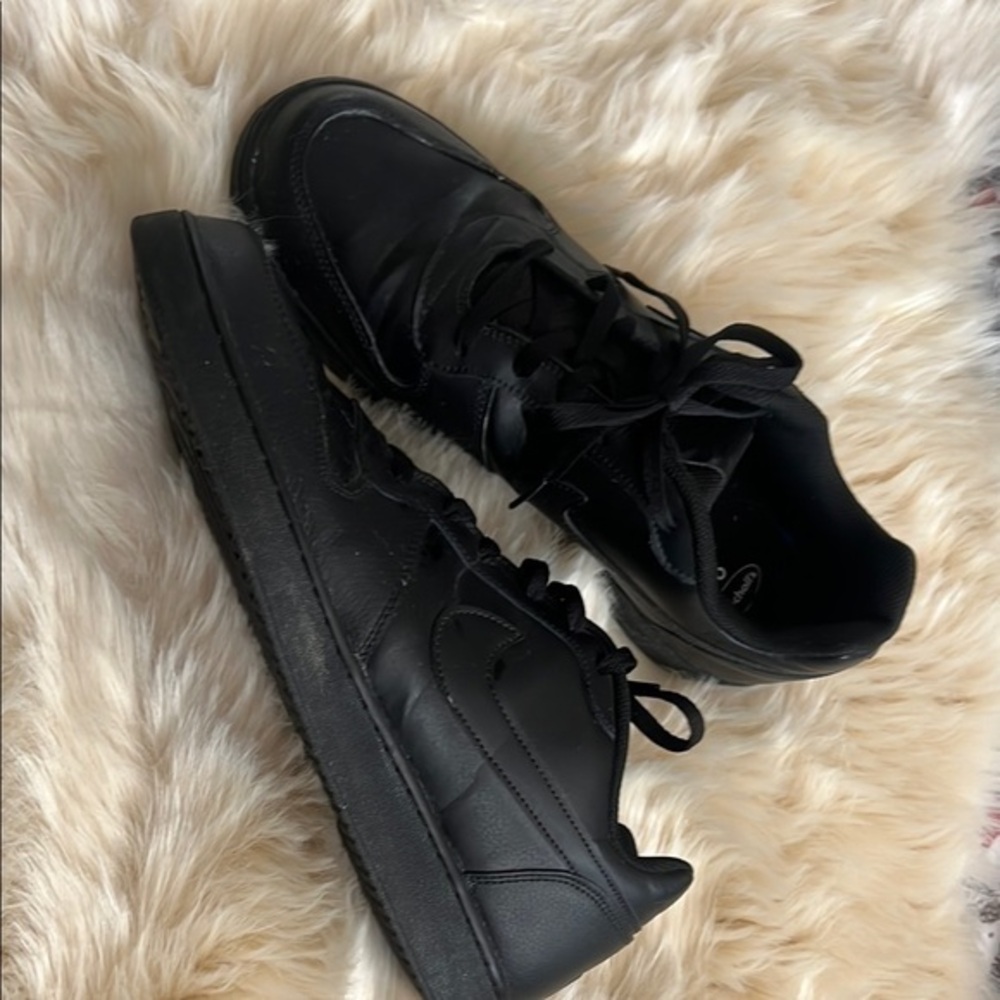 Sleek Black Low-Top Nike sport shoe